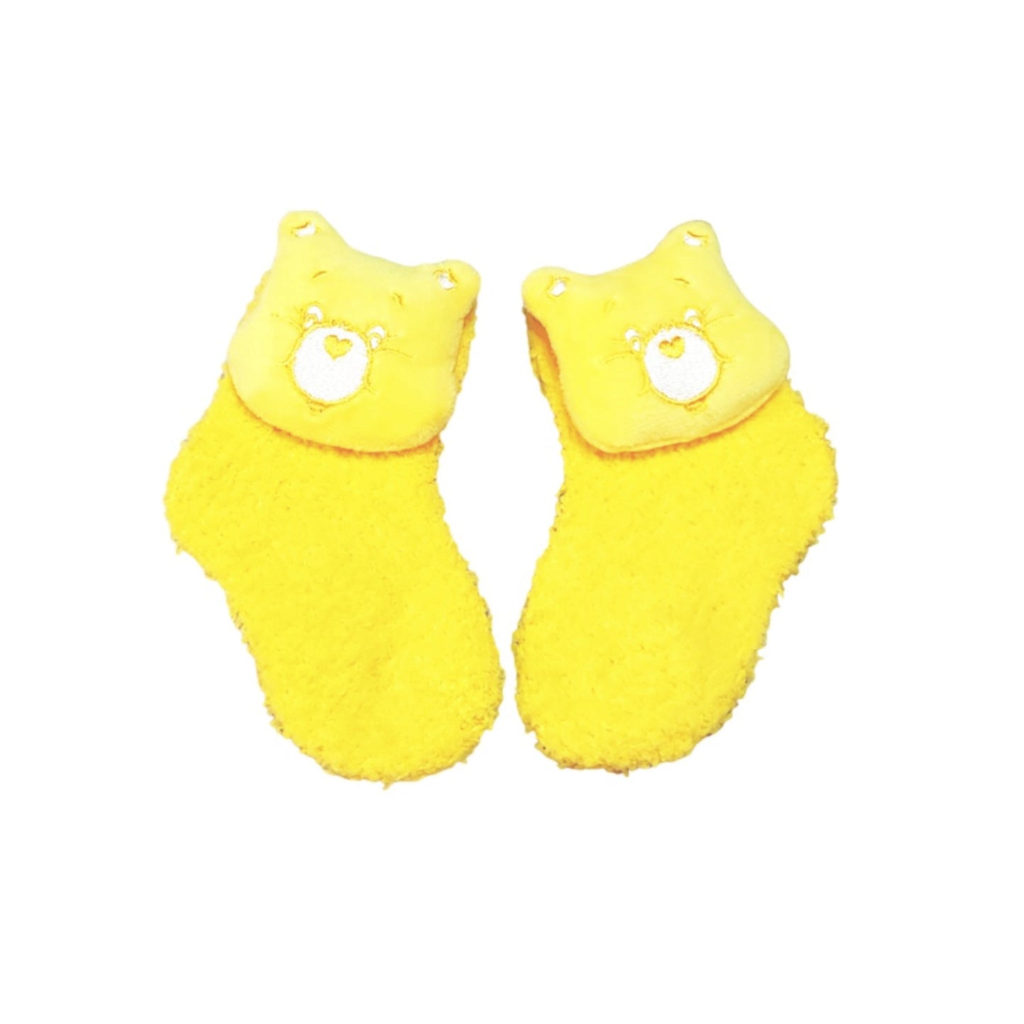 Yellow Care Bear fuzzy socks for baby and toddler