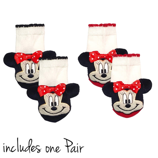 Handmade baby socks with plush Minnie Mouse-style head for ages 3 to 12 months
